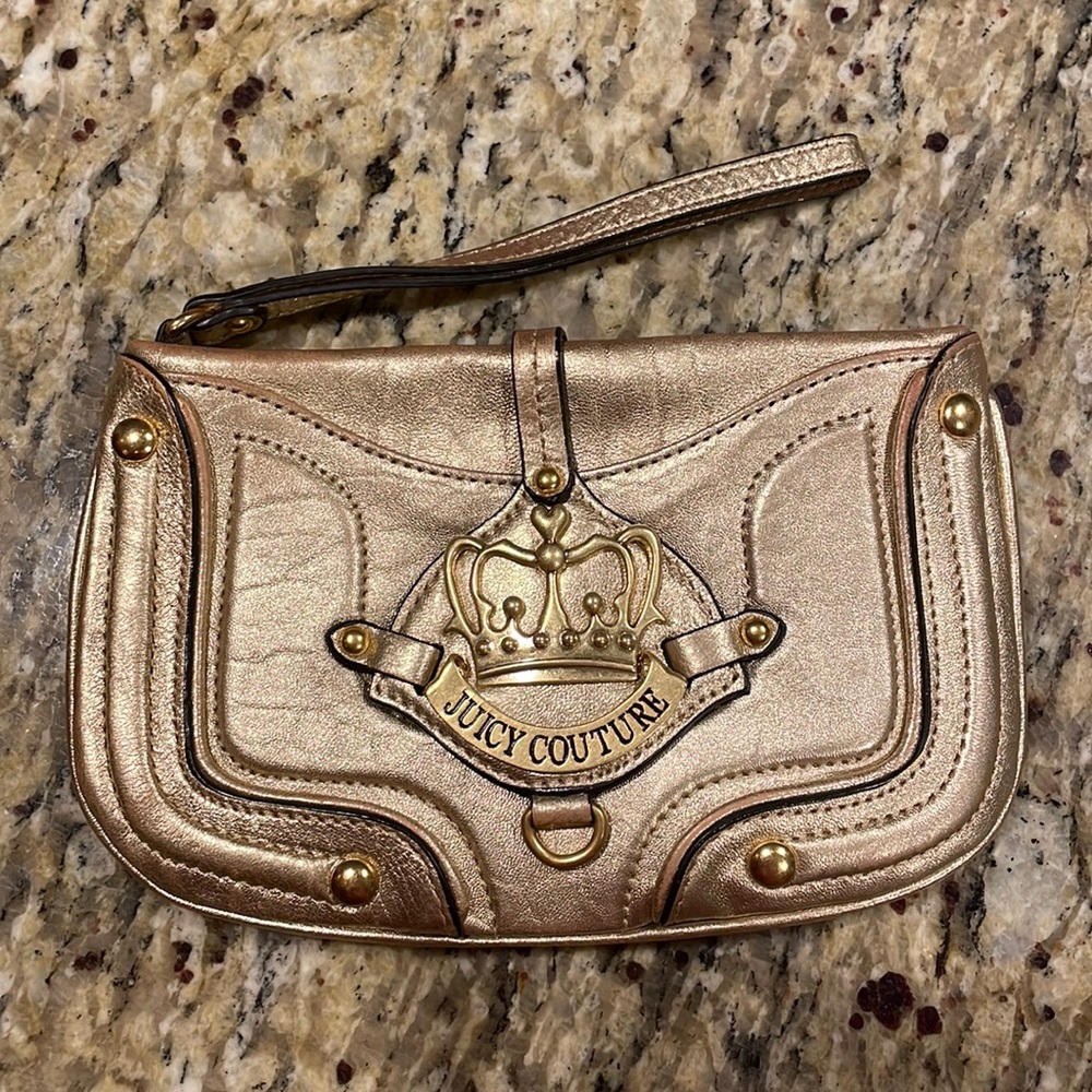 Juicy Couture gold leather wristlet, great condition. Fits cell phone plus other